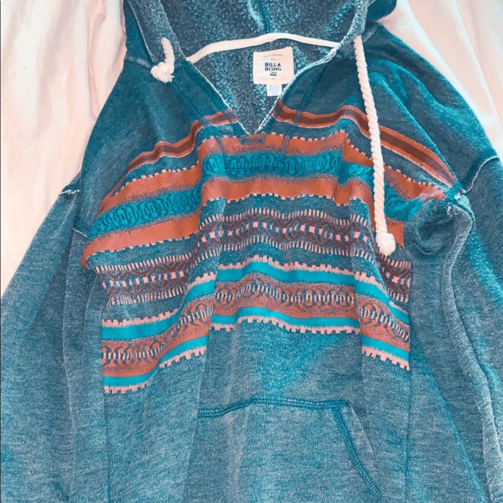 a blue Billabong hoodie